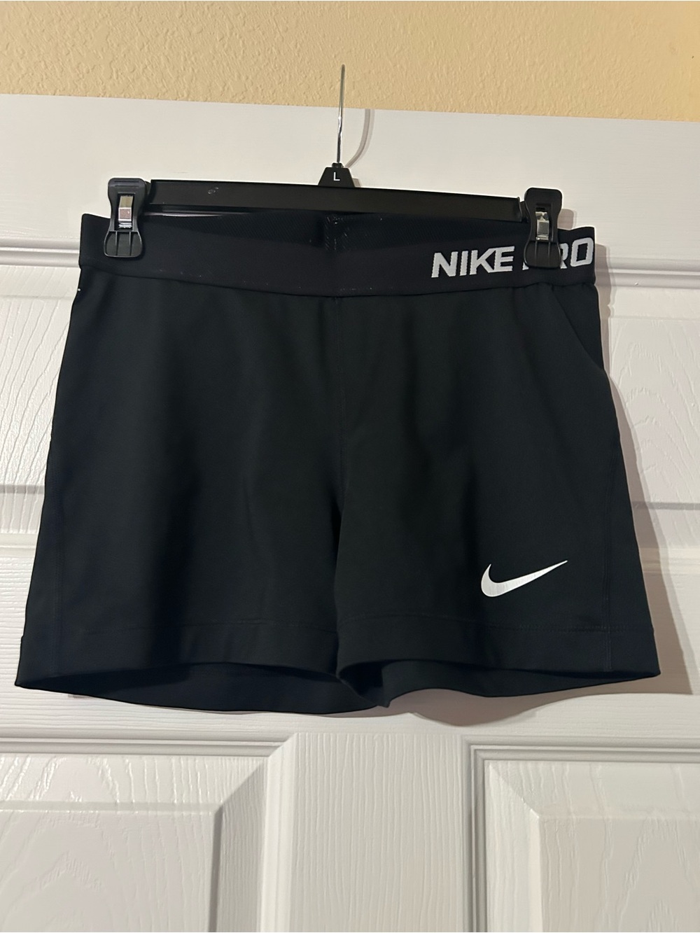 Nike Black Women's Athletic Shorts with White Swoosh